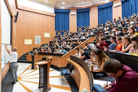 Lecturer gives a university lecture