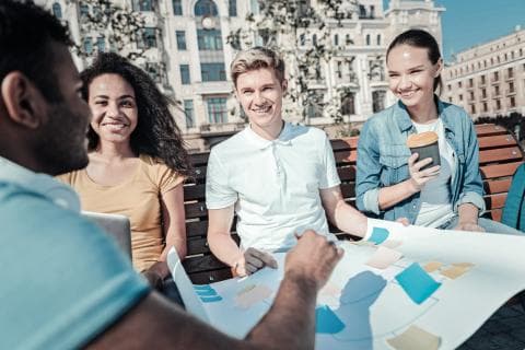 A group of four students working on a project 