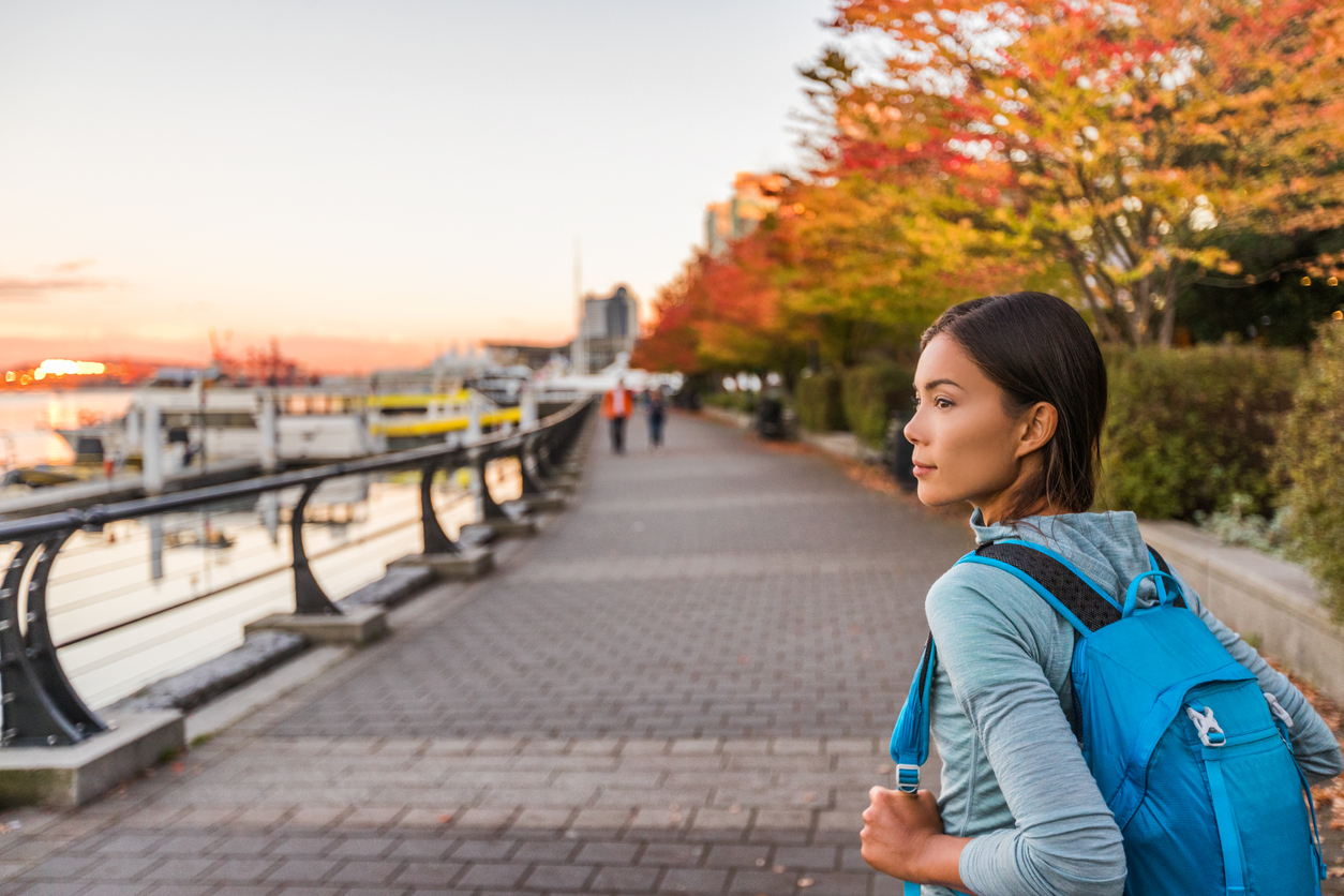 Student walking along Vancouver harbour area