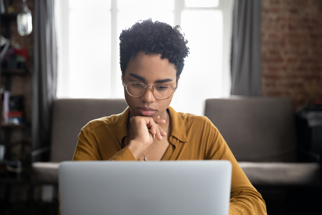 Student at computer, concentrating