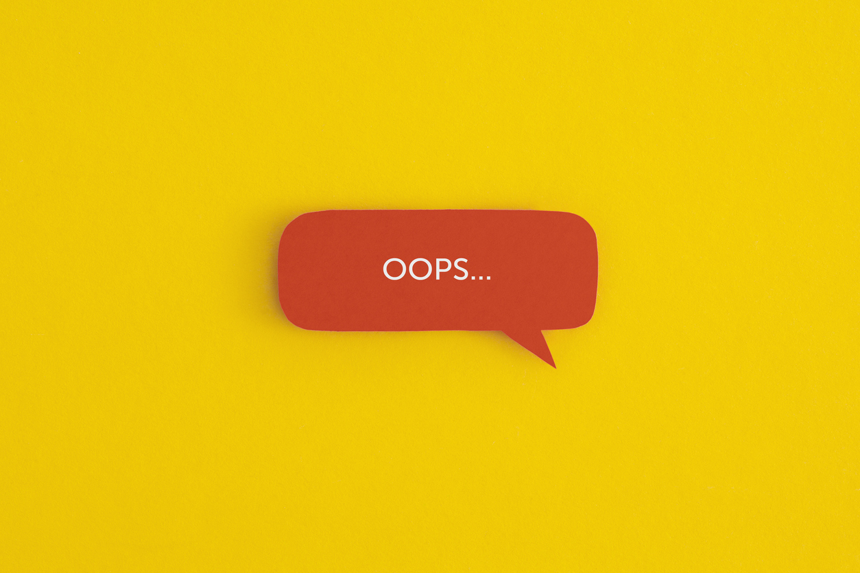 Speech bubble containing the word "Oops"