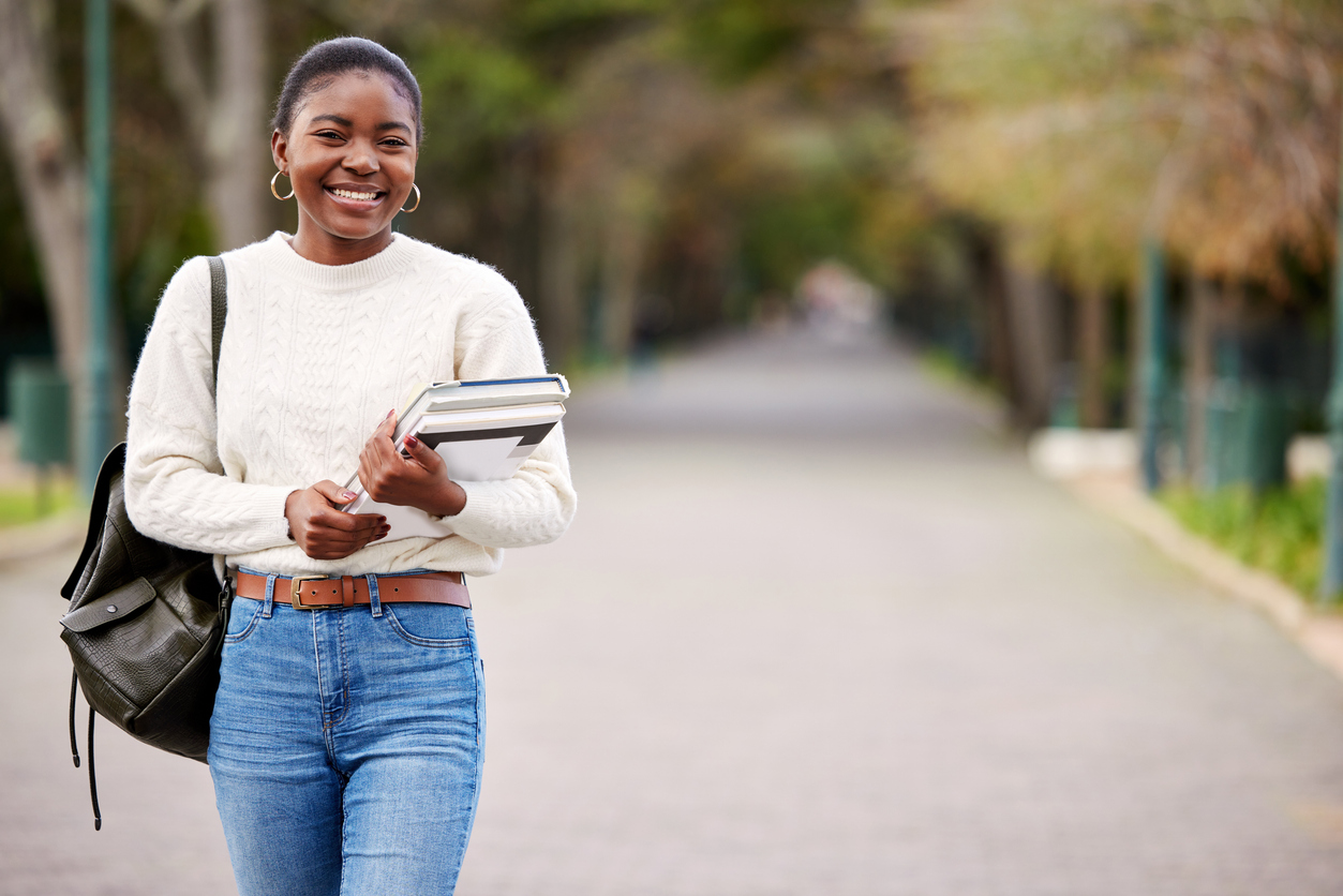 Student walking through campus in South Africa