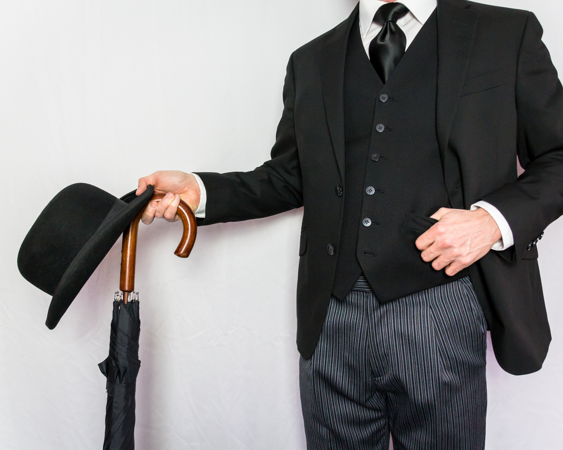 Businessman, with bowler hat and umbrella