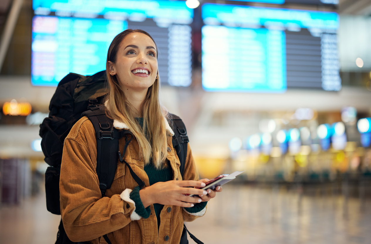 Student at airport, embarking on gap year