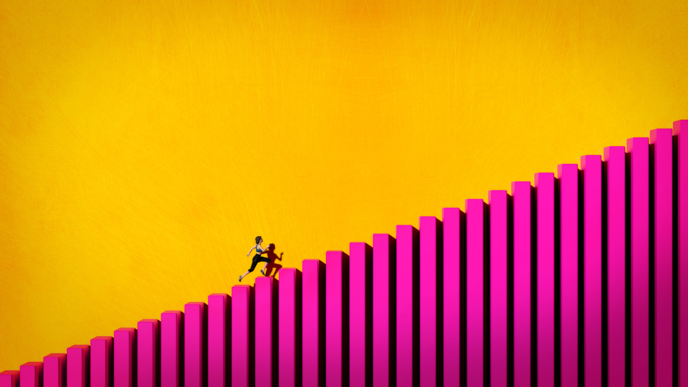 Person running up enormous stairs