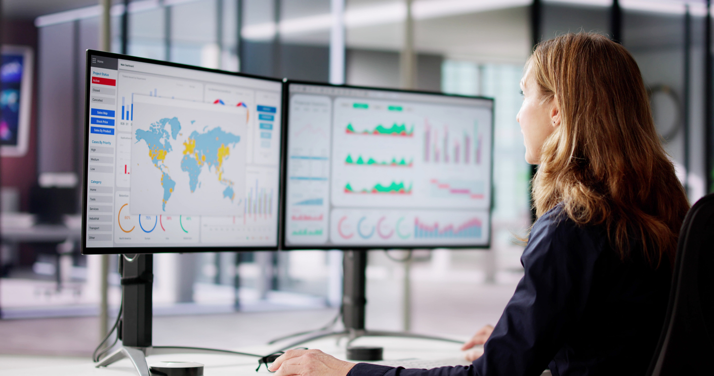 Woman looking at data on computer 