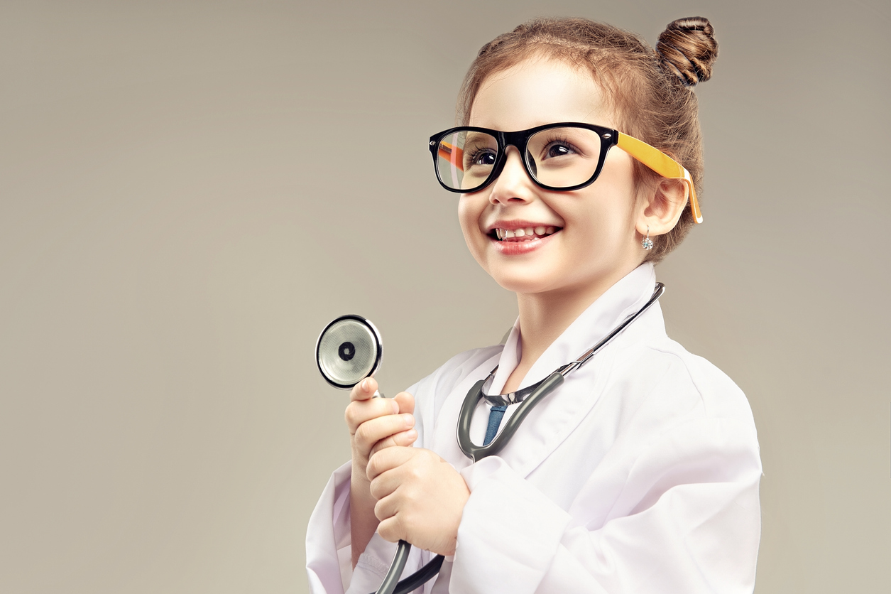 Young child dressed as doctor