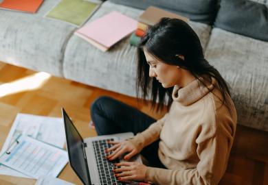 Student sitting at her laptop