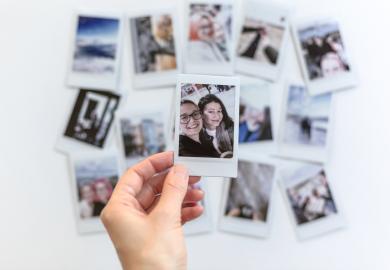 Student looking at photos from home