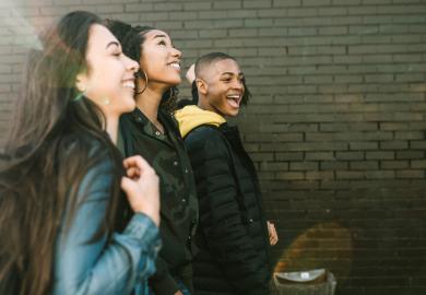 A group of students, walking to class at a US university