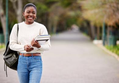 Student walking through campus in South Africa