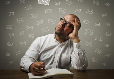 Man, writing letter, surrounded by images of envelopes