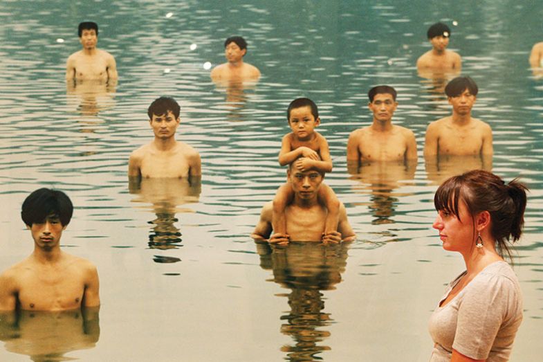 Photograph by Chinese artist Zhang Huan is inspected at National Gallery of Victoria