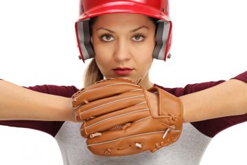A female baseball pitcher symbolising female leaders