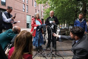 Robert and Margaret Abrahart read a statement outside Bristol County Court