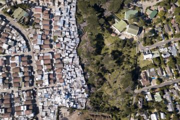 Aerial overhead township and middle class houses in South Africa