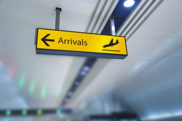 Arrivals sign at airport