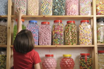 Child in sweet shop