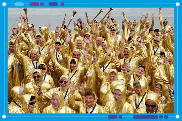 Crowd of people wearing gold suits, to illustrate the success at Johns Hopkins University in winning research grants