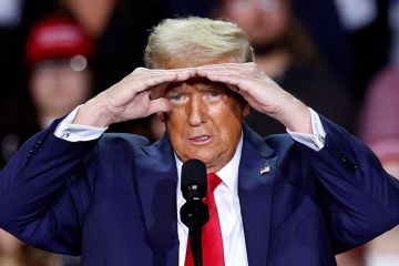 Donald Trump gestures as he speaks during a campaign rally at Van Andel Arena in Grand Rapids, Michigan on November 5, 2024. The UK higher education sector could benefit Trump's restrictive immigration policies.