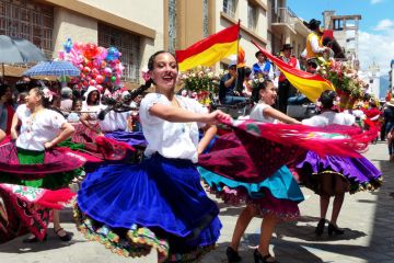 Folk dancers at the parade, Cuenca, Ecuador