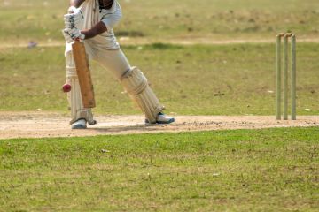 An Indian cricketer plays a defensive shot