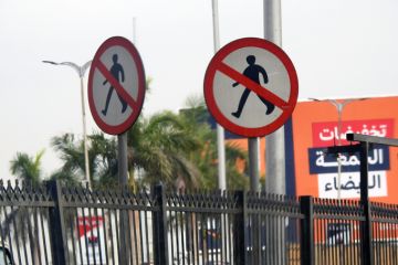 Giza, Egypt, December 30 2021 Prohibition No Pedestrian Sign, no entry sign, a warning sign not to cross the road, selective focus of not to cross or walk the road