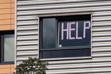 Students have posted messages on the windows of their halls of residence at Abertay University in Dundee