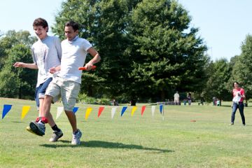 Two boys in a three-legged race