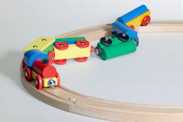 Wooden toy train crash
