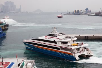 Kowloon, Hong Kongaa March 15 2013 Passenger Ferry to China leaves Kowloon terminal, Hong Kong on March 15th, 2013