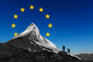 Climbers walk towards the Matterhorn mountain in Switzerland, with superimposed stars from the EU flag. To illustrate Switzerland joining Horizon Europe.