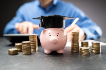 A piggy bank with a mortar board