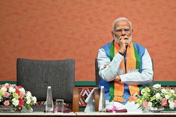 India’s Prime Minister Narendra Modi attends the release of the Bharatiya Janata Party’s manifesto, 14 April 2024
