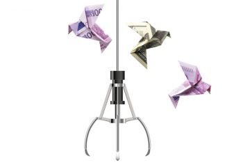Montage of a money grabber claw with origami birds made out of bank notes to illustrate Some money would be nice