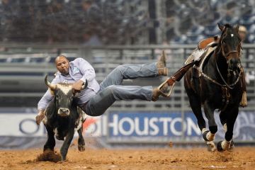 Darrell Petry leaps off his horse as he competes in Steer Wrestling during the Rodeo Houston BP Super Series II, in Houston to illustrate Fixing America’s broken credit transfer system