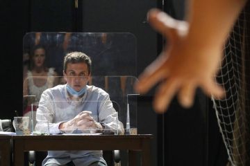 Person behind a screen during entrance auditions for the Acting Department of the Russian University of Theatre Arts