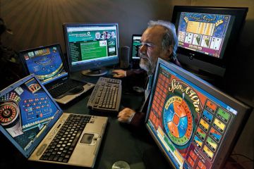 Gambling addict watching multiple casino websites to illustrate Campus casino idea ‘preposterous’