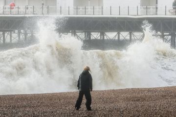  Storm waves break against Brighton Palace Pier to illustrate Bumper rises in postgraduate fees at some UK institutions