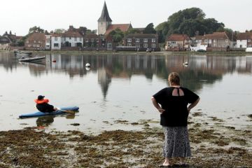 Trapped in the mud, Bosham harbour,  Sussex, UK to illustrate English HE braces for funding review