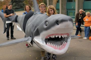 People inside a shark costume