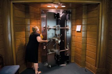 Person opens the library's vault located in the basement of the Folger Shakespeare Library, Washington to illustrate US universities protest against research fraud transparency rules