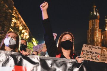 University students, women's rights activists and their supporters at  anti-government protest in Krakow  expressing anger with at the Supreme Court ruling which tightened the already strict abortion laws.