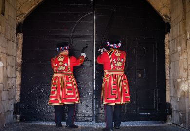 Two Yeoman Warders closing doors to illustrate whether Labour want more people to go to university