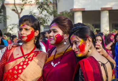 Students at the Rabindra bharati University Complex in Kolkata are all celebrating the Holi Festival.