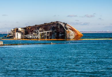 Odessa, Ukraine 12.04.2019. The wreck of a small tanker `DELFI` off the coast of Odessa on a sunny winter day