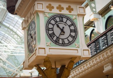 Queen Victoria Building, Sydney, Australia - May 14 2022  Lower section of the iconic Royal Clock with its distinctive black lined circle clock-face and Roman numerals framed by a light green square.