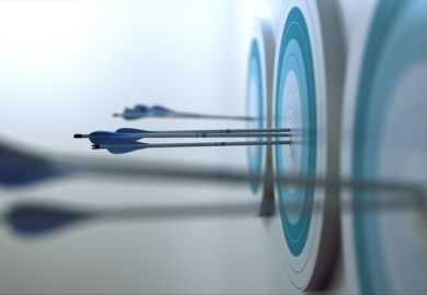 Arrows hitting a bullseye target