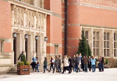 People in Chancellors Court, University of Birmingham, a red brick university, Edgbaston campus, UK