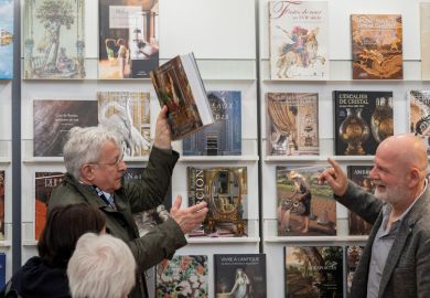 Visitors browse books during the first day of the London Book Fair at Hammersmith's Olympia Exhibition Hall to illustrate ‘Expect some softening’: where next for open-access books in REF?